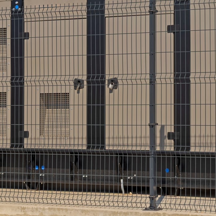 Close-up of a generator enclosure with ventilation grilles